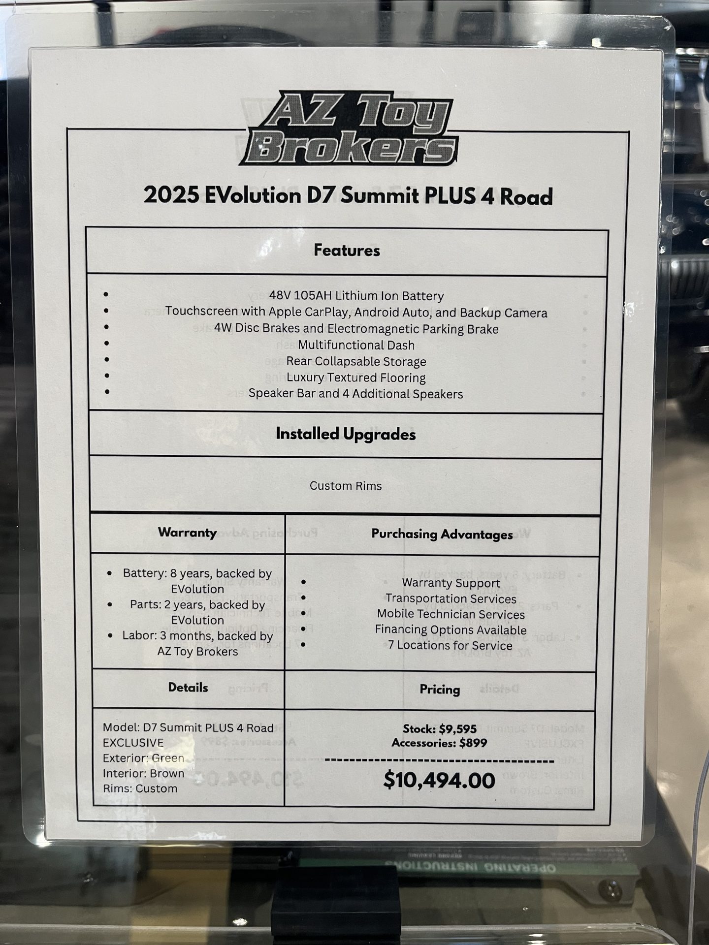 Customer receiving keys for Evolution D-MAX XT4 golf cart with easy financing approval
