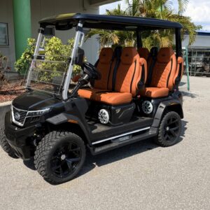 Alt: 2026 Evolution D-MAX XT4 golf cart exterior view 4 passenger lithium electric cart