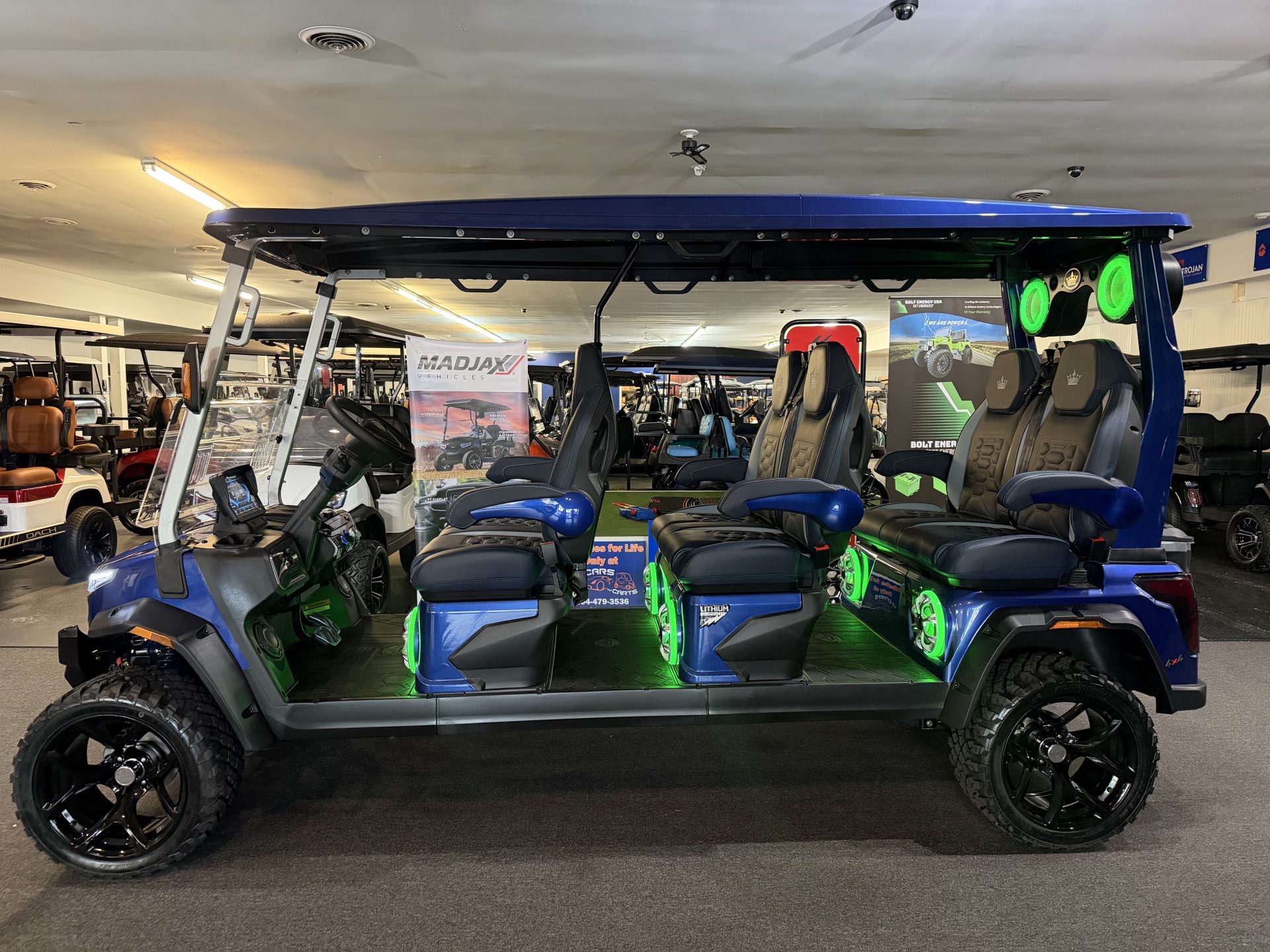 2026 Evolution D-MAX XT6 golf cart exterior 6 passenger lithium luxury cart