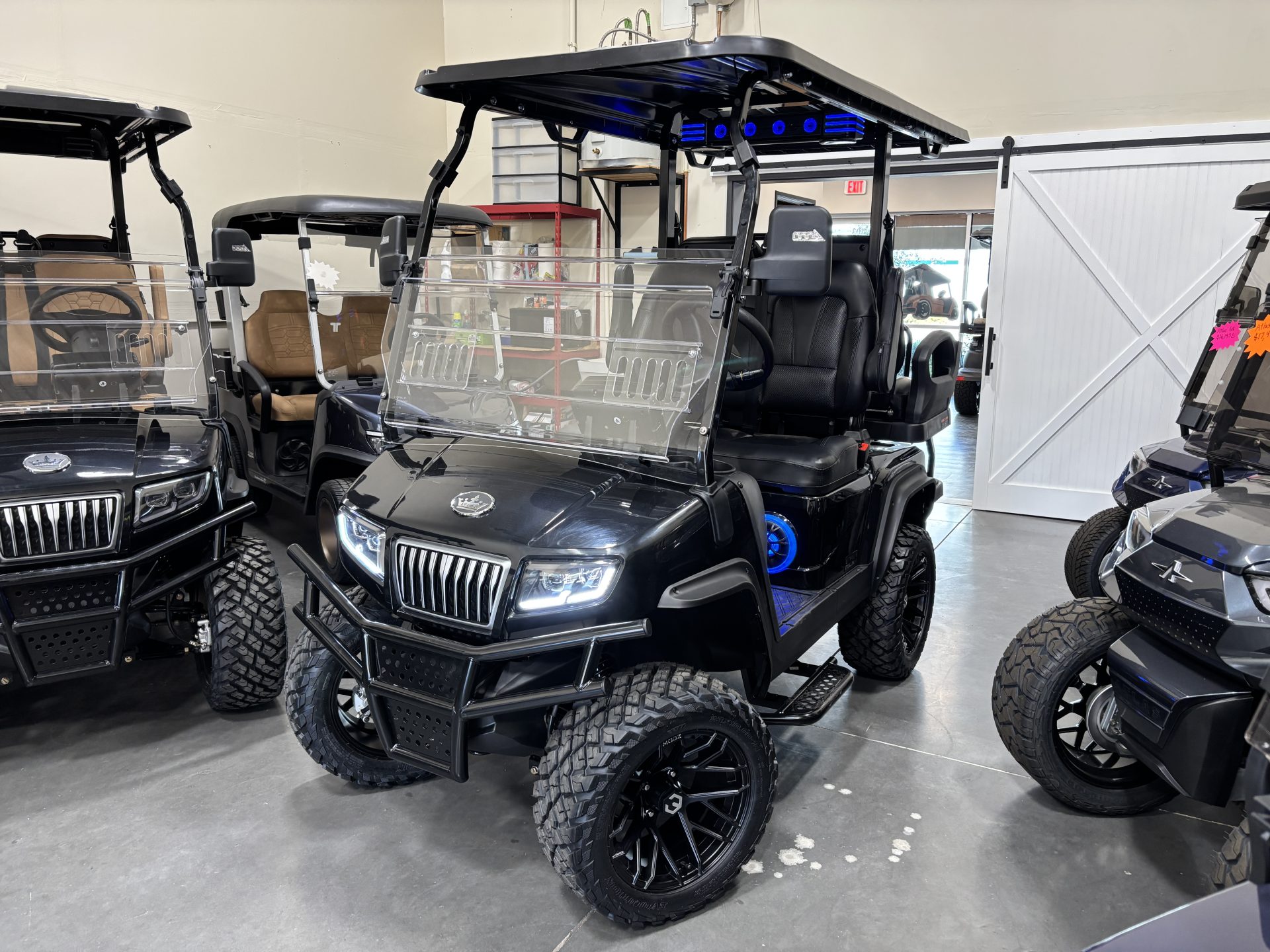 2026 Evolution Maverick 2+2 Plus black custom golf cart